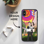 Succulent, airpods and iPhone XS Max lying on the table. Smartphone has a custom design biodegradable case on it. Design contains an illustration of a couple turned into Rick and Morty cartoon characters. Text on the image says: Your Design Here. An arrow is pointing from the text to the phone.
